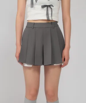 Layered pocket pleated mini skirt