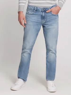 Low Rise Slim Tapered Denim Jeans in Light Wash